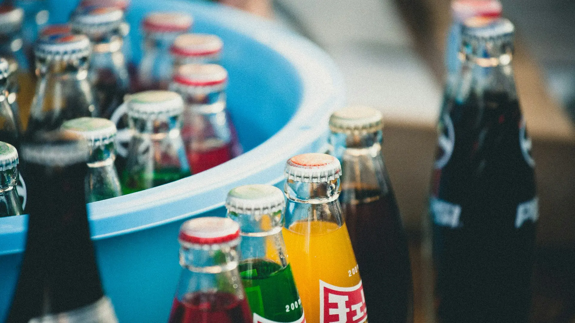 Beverage distributor Odoo solutions -closeup of soda bottles beside basin